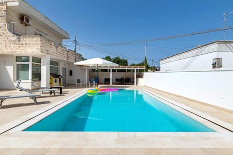 Property building, Living room, Swimming pool