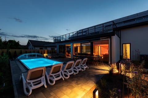 Property building, Night, Swimming pool