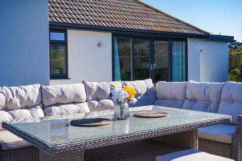 Property building, Patio, Patio, Garden, Seating area