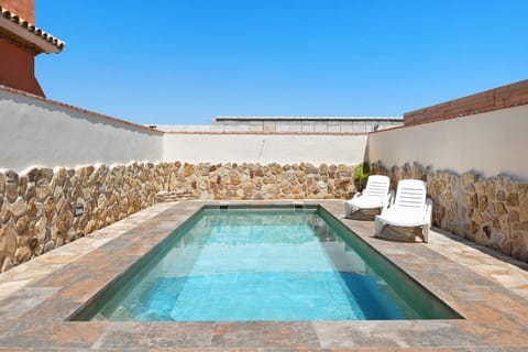 Property building, Living room, Swimming pool