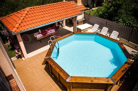 Property building, Patio, Day, Garden, Pool view, Swimming pool, Swimming pool