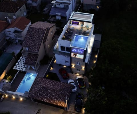 Property building, Night, Bird's eye view, Swimming pool