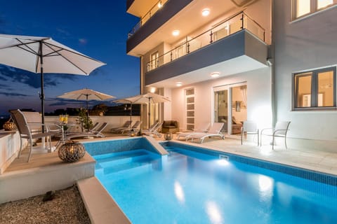 Property building, Night, Swimming pool, sunbed