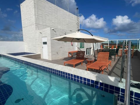 View (from property/room), Dining area, Swimming pool, sunbed