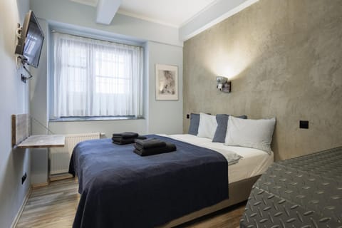 Bed, TV and multimedia, towels