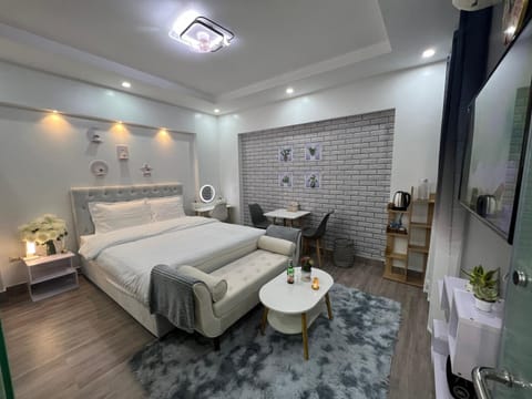 Shower, Toilet, Bed, Seating area, Bedroom, bidet, fireplace, heating, locker, towels, wardrobe, dryer, air conditioner
