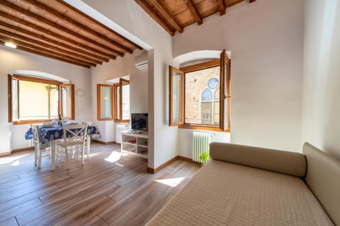 Bed, Living room, Seating area, Dining area