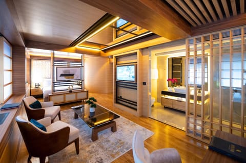 Communal lounge/ TV room, Bed, TV and multimedia, Living room, Photo of the whole room, Seating area, Evening entertainment, Bedroom