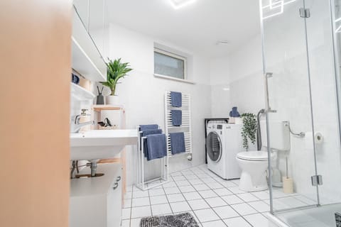 Shower, Bathroom, towels, washing machine, dryer