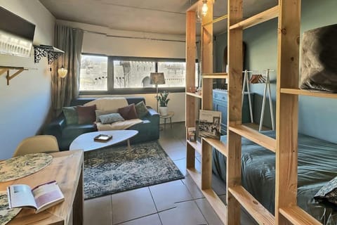 Bed, TV and multimedia, Living room, Photo of the whole room, Seating area, Bedroom