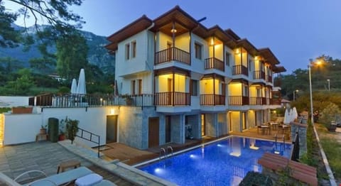 Property building, Night, Pool view, Swimming pool, sunbed