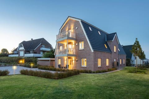 Villa Dornkamp 1 - Luxuriöse Ferienwohnung für 4 Personen inklusive Sauna und Garten Apartment in Timmendorfer Strand