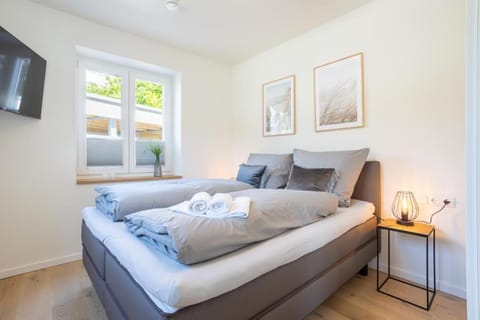 Villa Dornkamp 1 - Luxuriöse Ferienwohnung für 4 Personen inklusive Sauna und Garten Apartment in Timmendorfer Strand