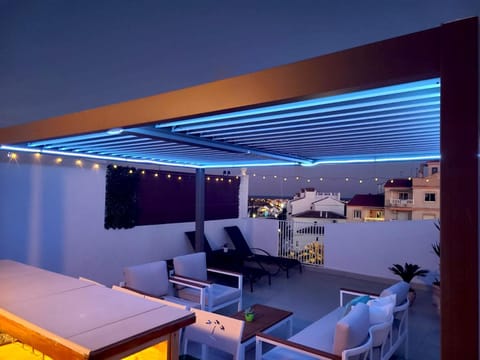Night, View (from property/room), Balcony/Terrace, Seating area, Evening entertainment, City view, Pool view, Sea view, Entertainment