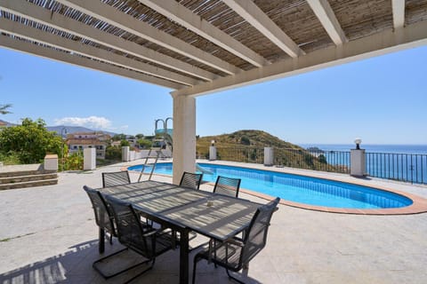 Property building, Living room, Swimming pool