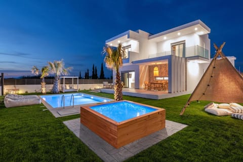 Property building, Patio, Night, Natural landscape, Garden, Garden view, Pool view, Swimming pool, sunbed