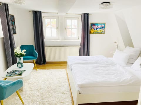 Bed, Seating area, Bedroom