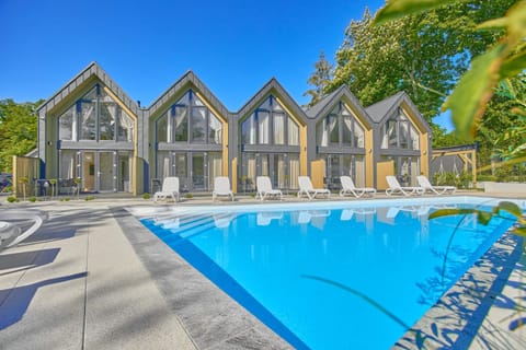 Property building, Pool view, Swimming pool, sunbed