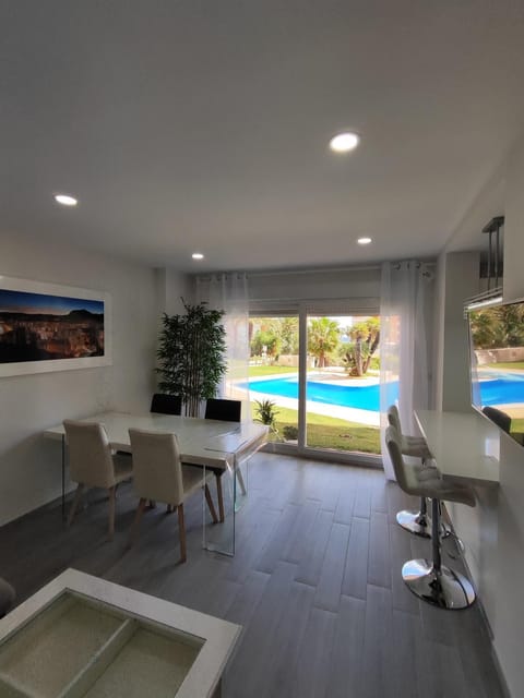 Living room, Seating area, Pool view, Swimming pool, sunbed