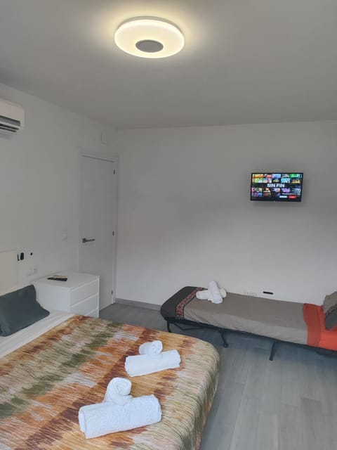 Bed, Photo of the whole room, Bedroom, towels, air conditioner