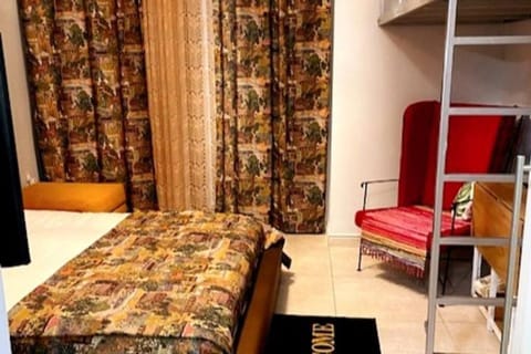 Bed, Seating area, Bedroom
