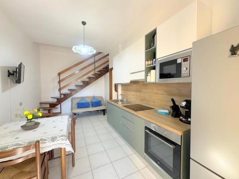 Dining area, dishwasher, oven, stove
