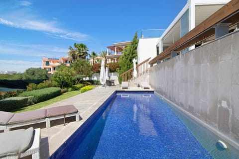 Property building, Living room, Swimming pool