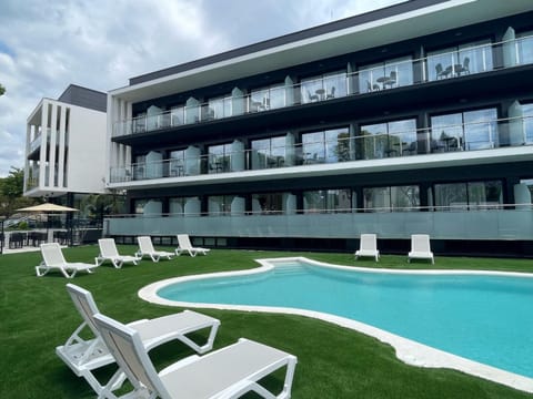 Property building, Patio, Swimming pool, sunbed