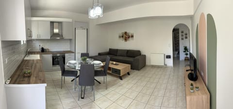 Kitchen or kitchenette, Living room, Seating area, Dining area
