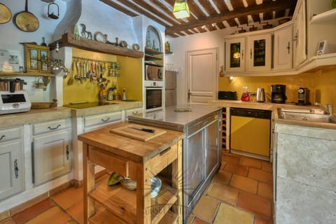 Kitchen or kitchenette, dishwasher, oven, stove, toaster