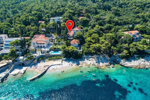 Property building, Nearby landmark, Natural landscape, Bird's eye view, Beach