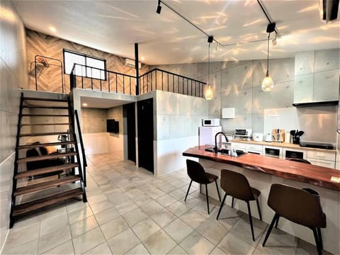 Kitchen or kitchenette, Living room, Dining area, minibar, stove, toaster