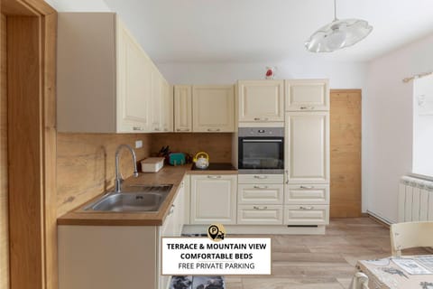 Kitchen or kitchenette, stove, toaster