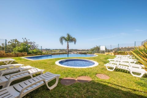 Property building, Living room, Swimming pool