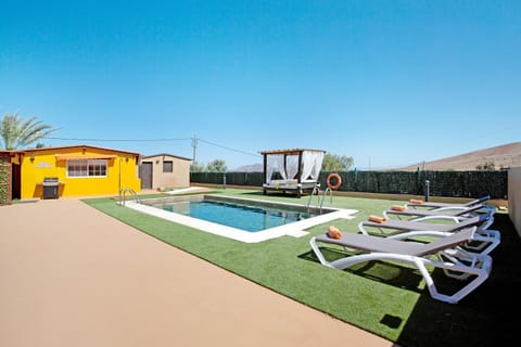 Property building, Living room, Swimming pool