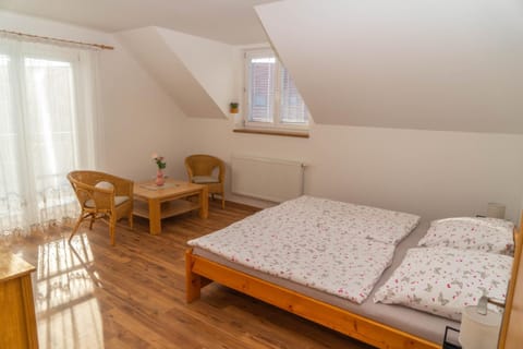 Bed, Seating area, Bedroom