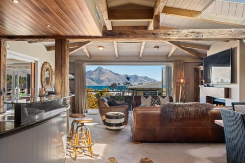 Natural landscape, TV and multimedia, Living room, Seating area, Lake view, Mountain view