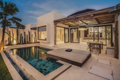 Property building, Seating area, Pool view, Swimming pool, sunbed