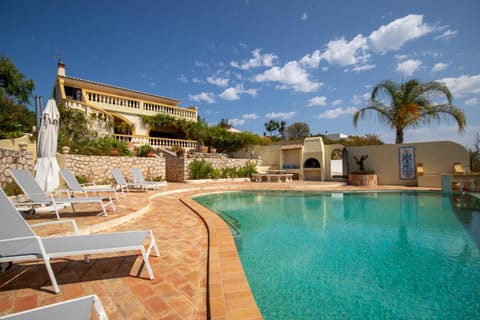 Property building, Patio, Pool view, Swimming pool, Swimming pool, sunbed