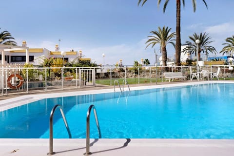 Property building, Living room, Swimming pool