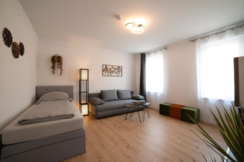 Bed, Living room, Seating area