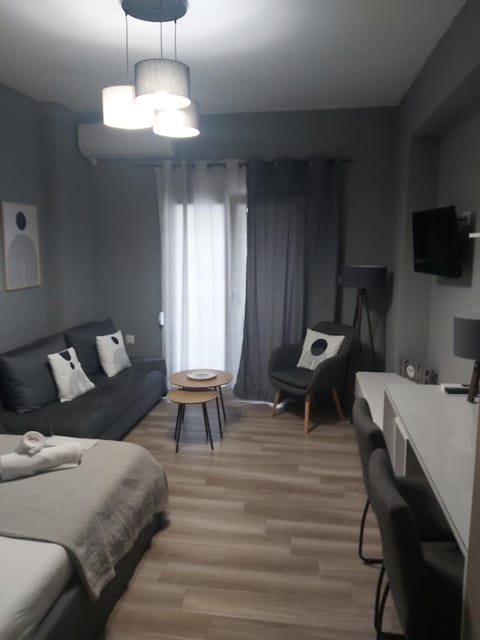 Communal lounge/ TV room, Bed, Seating area
