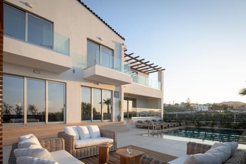 Property building, Patio, Natural landscape, View (from property/room), Balcony/Terrace, Seating area, Pool view, Swimming pool, sunbed