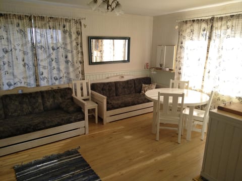 Bed, Living room, Seating area, Dining area