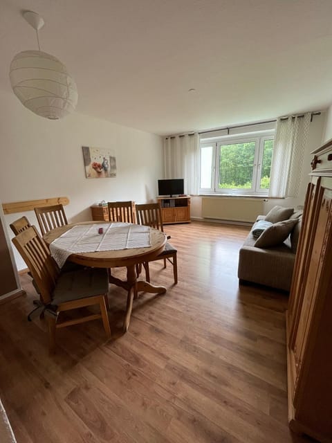Bed, Living room, Seating area, Dining area