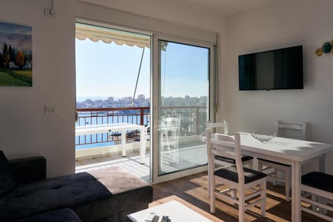 TV and multimedia, View (from property/room), Balcony/Terrace, Living room, Seating area, Dining area, Sea view