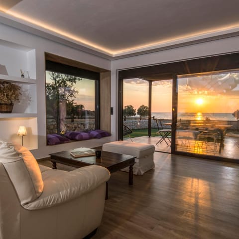 View (from property/room), Balcony/Terrace, Living room, Seating area, Sunset