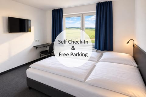 Property building, Bed, Property logo or sign, Property logo or sign, Logo/Certificate/Sign, towels