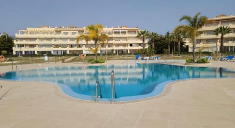 Property building, Pool view, Swimming pool, sunbed