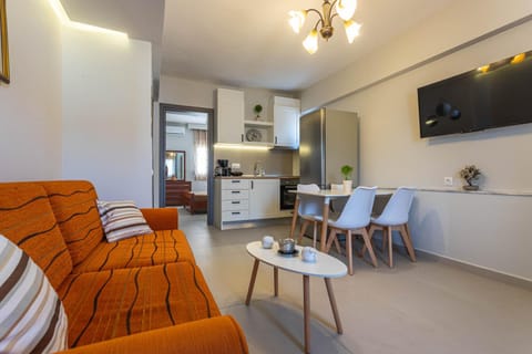 Property building, TV and multimedia, Living room, Seating area, Dining area